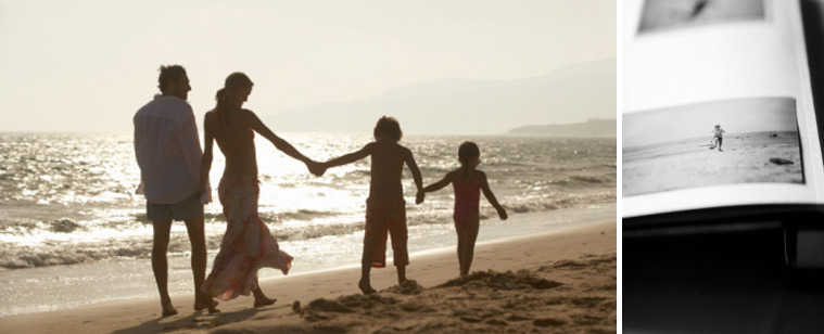 Happy family on beach by professional photographer on board
